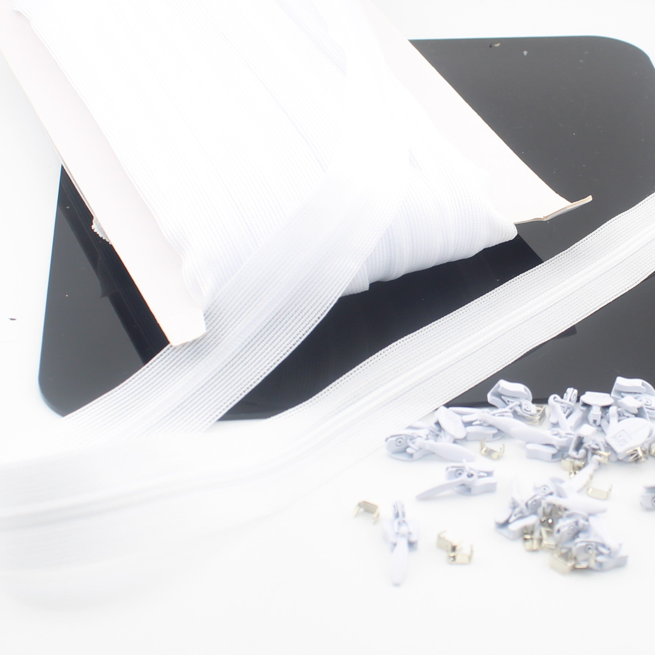 Onzichtbare rits op rol, 10 m, met 20 schuivers en stoppers | Set voor blinde naa rits
